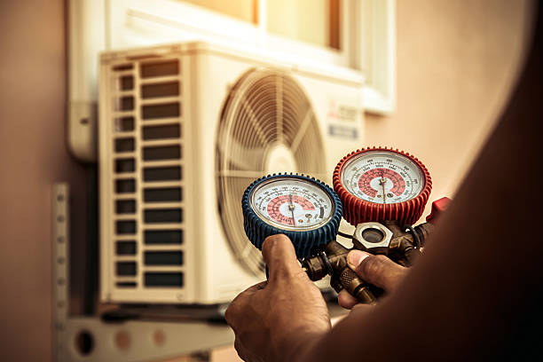 Professional Ac Installation technician working in Wells, MN